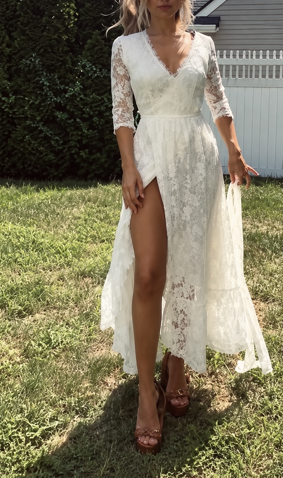 Francesca wearing the Maribel ivory lace dress outdoors