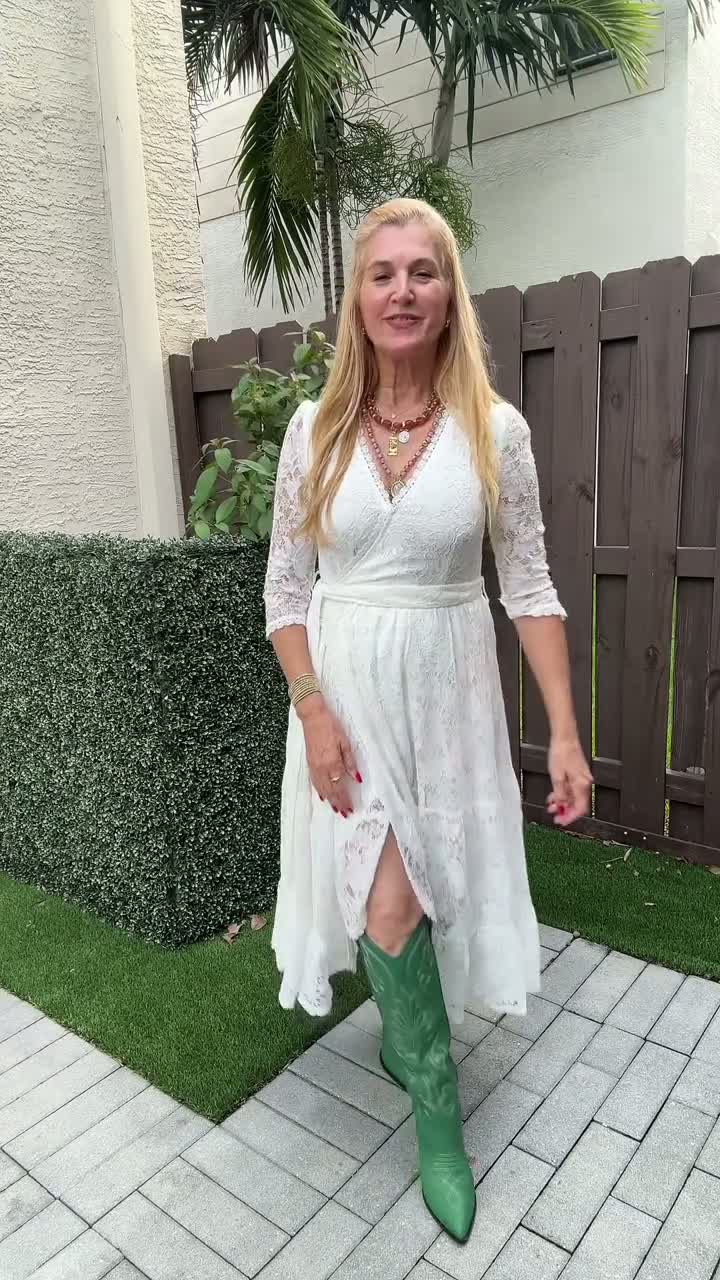 Annie wearing the Maribel lace dress, size M